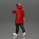 Man in a long hoodie  walking and looking at his watch - Only-Games