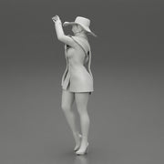 girl in christmas costume with hat standing and posing - Only-Games