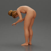 Naked Girl standing behind her boyfriend gently touching his face - Only-Games