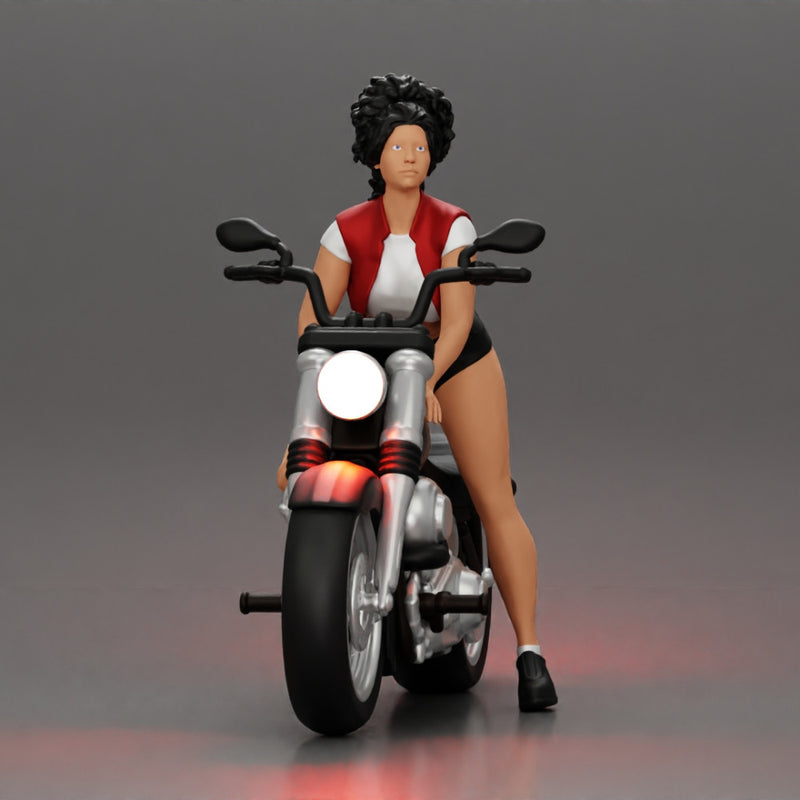 attractive girl on the motorbike in shorts and a mini jacket with curly hair