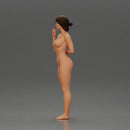 Naked woman standing hand resting on her back speaking into a radio - Only-Games