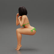 Sexy girl in bikini sitting - Only-Games