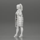 Sexy girl in shorts and long jacket standing - Only-Games