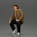 hip hop man sitting in a jacket and cap - Only-Games