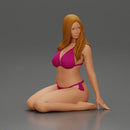 Beautiful Woman in Bikini Sitting on the Beach - Only-Games