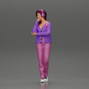 young woman listening to music with headphones and carrying a backpack - Only-Games