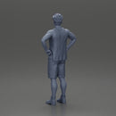 Man standing with his hands on his hips thinking and wondering - Only-Games