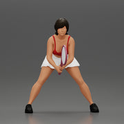 sexy tennis player in skirt holding her racket in a ready position - Only-Games