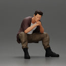 Thoughtful Man Squatting in Casual Outfit, Deep in Contemplation - Only-Games