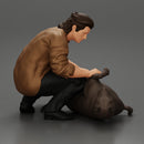 man sitting on the sidewalk and petting his dog - Only-Games