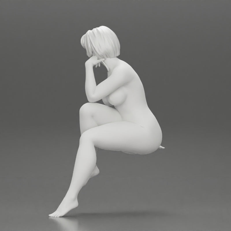 Naked woman sitting thinking