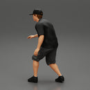 Man bent over while walking in cap - Only-Games