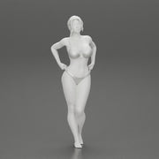 Fit hot woman in bikini taking off swimsuit panties on the beach - Only-Games