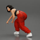 Girl mechanic in overalls turns off the front wheel of  car with a key for removing the wheel - Only-Games