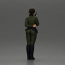policewoman standing hand resting on her back speaking into a radio with short hair - Only-Games