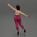 Happy Young Woman in pants Standing on One Leg holding phone - Only-Games