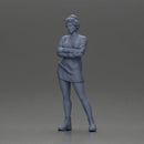 Woman in Orange Dress and Boots Stands Stylishly Confidence With Arms Crossed - Only-Games