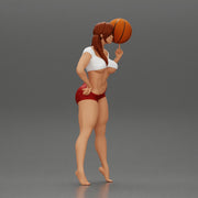 Sexy Young Sporty Girl Playing With the Ball on the Basketball - Only-Games