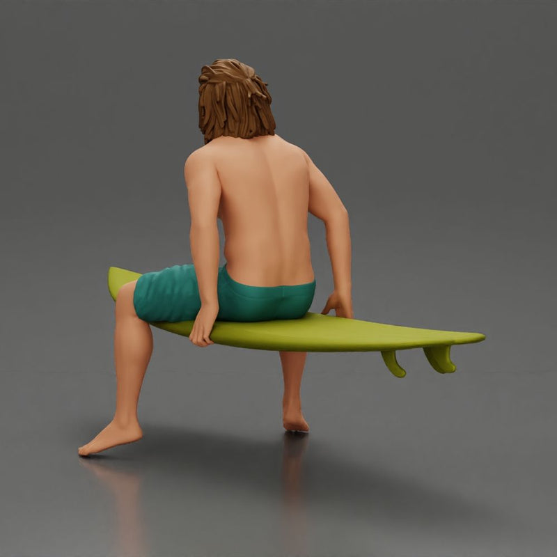 Long-Haired Surfer Sitting on a Surfboard in Calm Ocean Waters, Waiting for the Waves