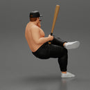 gangster man in a cap sitting holding a baseball bat and smoking - Only-Games