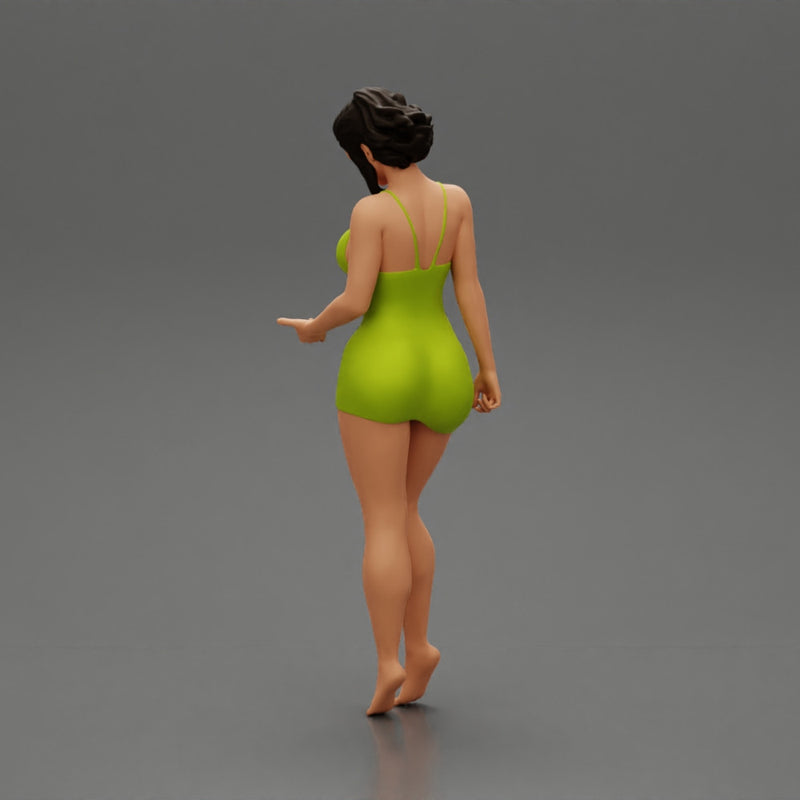 Sexy Girl standing in mini dress on the beach - Only-Games
