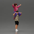 Man in shorts carrying girlfriend on shoulders girl being carried on the man's shoulders - Only-Games
