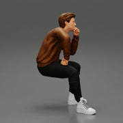 man in leather jacket sitting in thinking pose - Only-Games