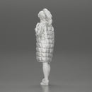 Sexy girl in shorts and long jacket standing - Only-Games