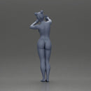 Naked woman taking a selfie with her phone on the beach - Only-Games