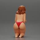 Sexy girl in bikini sitting and covering her body by towel - Only-Games