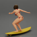 Sexy Girl in A Bikini Swimsuit Riding Wave on board - Only-Games