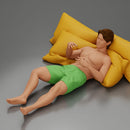 Man in green shorts reclining back raising hands with calm expression - Only-Games