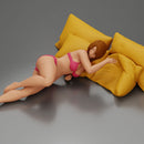 Woman in pink lingerie lying sideways resting arm with soft gaze - Only-Games