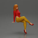 Stylish woman sitting confidently in red top yellow pants heels - Only-Games