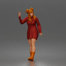 Cheerful Girl Waving Confidently in Stylish Dress and Boots