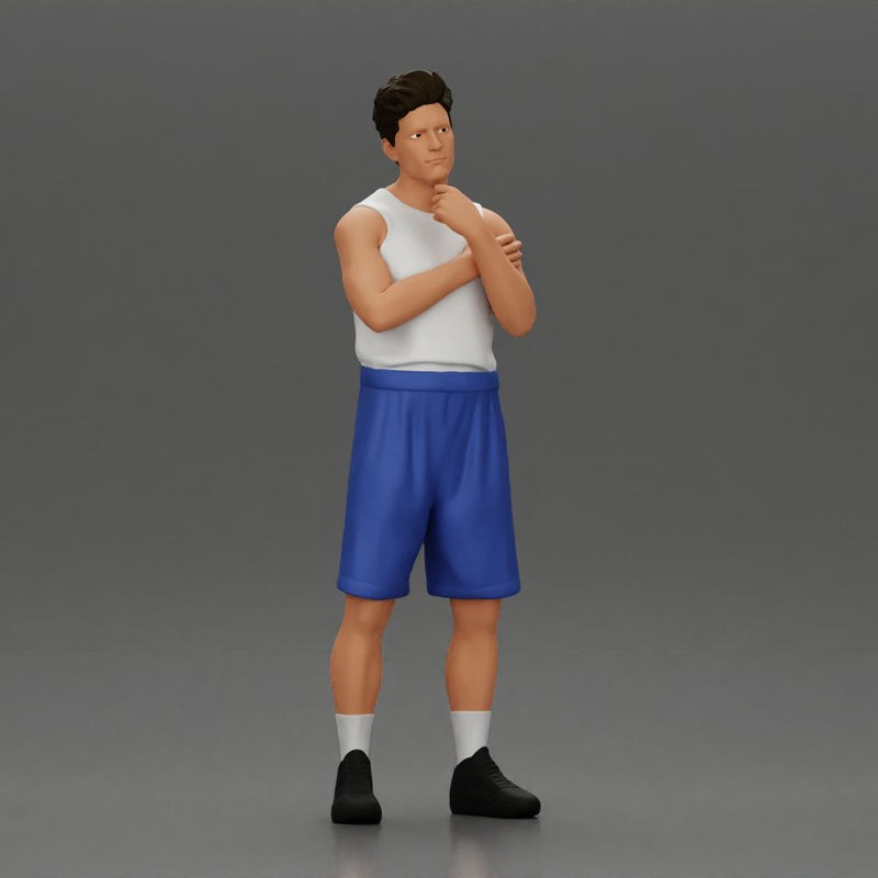 Thoughtful man stands in athletic gear pondering ideas with calm steady focus - Only-Games