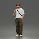 Casual Coffee Drinker Posing with Shoulder Bag Cargo Pants Sneakers