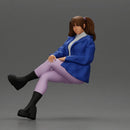 Stylish Woman in Blue Jacket Relaxing with Confident Poise - Only-Games