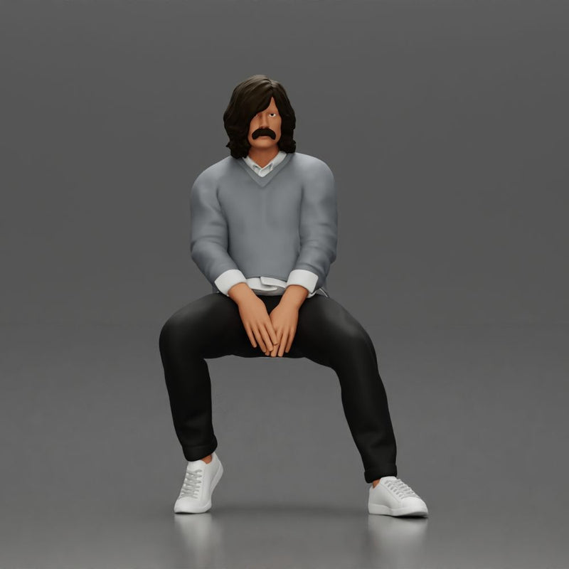Man in Casual Sweater and Sneakers Sitting with Relaxed Posture - Only-Games