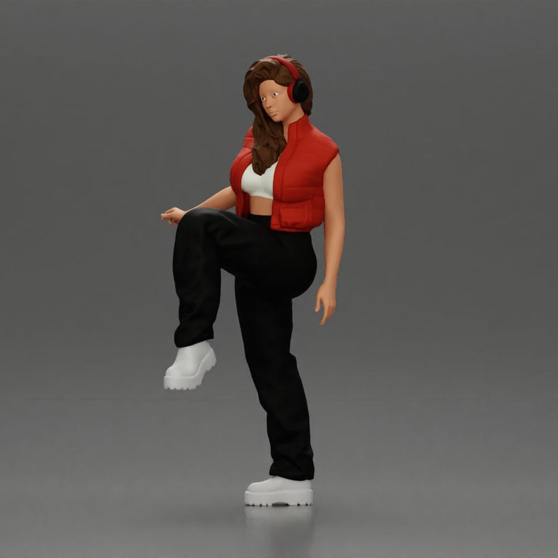 Woman in Headphones Lifting Leg in Stylish Streetwear - Only-Games
