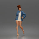 Elegant Woman Posing Confidently in Chic Jacket and Dress Outfit