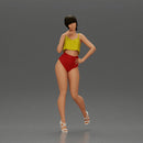 Striking a flirty pose wearing yellow crop top red bottoms - Only-Games