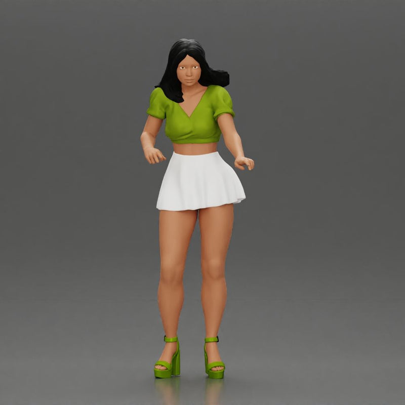 woman standing with a green top white skirt looking like they want to hold something - Only-Games