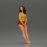 Woman in yellow top and red shorts leaning to wall - Only-Games