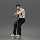 Senior Leaning On Cane Wearing Cap Suspenders Bow Tie Sneakers