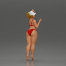 Stylish woman confidently posing in red bikini and white cap - Only-Games