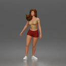 Trendy Woman Standing Confidently in Beanie, Crop Top, and Shorts