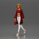 Woman with curly hair wearing red coat walking holding red handbag - Only-Games
