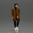 Man in brown coat glances sideways dressed in stylish winterwear - Only-Games