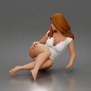 Woman lounges sideways wearing plunging bodysuit hair flowing barefoot relaxed - Only-Games